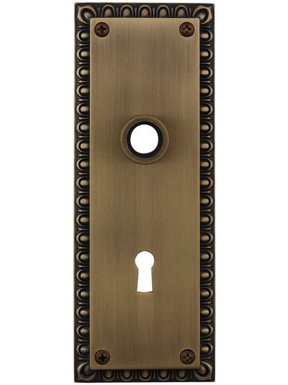 Ovolo Forged-Brass Back Plate with Keyhole in Antique Brass.